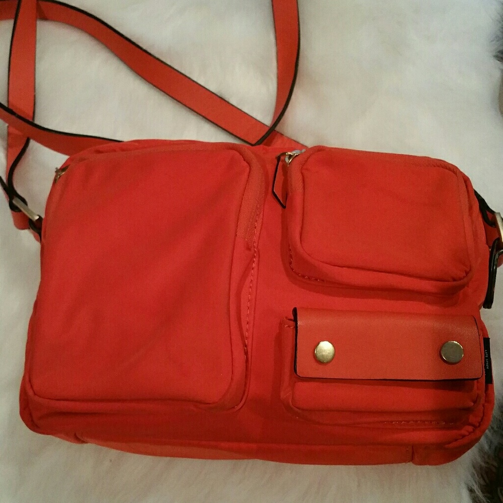 Like new red canvas Kate Spade "Saturday " bag